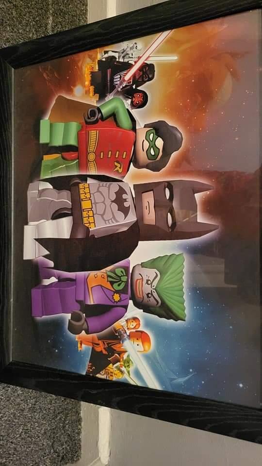 Preview of the first image of Lego superhero picture In glass frame.