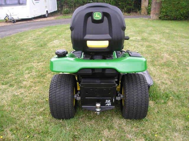 Preview of the first image of John Deere X350 ride on lawn tractor.