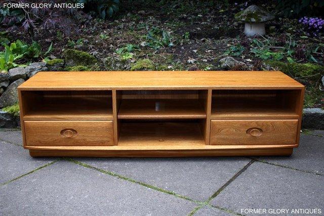 Preview of the first image of ERCOL WINDSOR LIGHT ELM TV CABINET MEDIA STAND UNIT TABLE.
