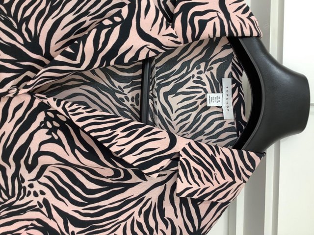 Preview of the first image of Baby pink and black zebra print long tops hop dress size 10.