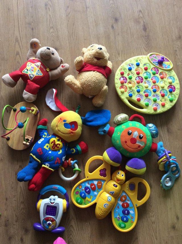 Preview of the first image of Assortment of baby toys with lights and sounds.