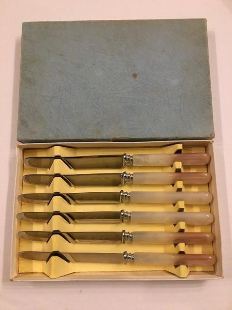 Preview of the first image of Set of 6 Vintage Butter/Tea/Side Knives Faux MOP Handles.