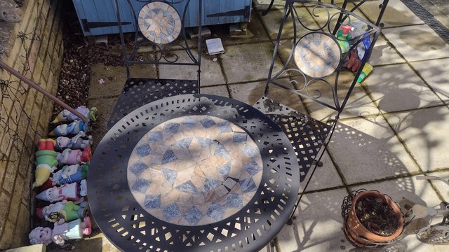 Preview of the first image of Mosaic Cast Iron Garden Table & Chairs.