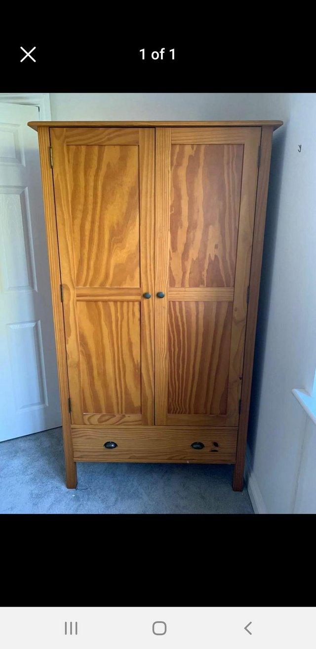 Preview of the first image of Cotswold wooden 2 door wardrobe.