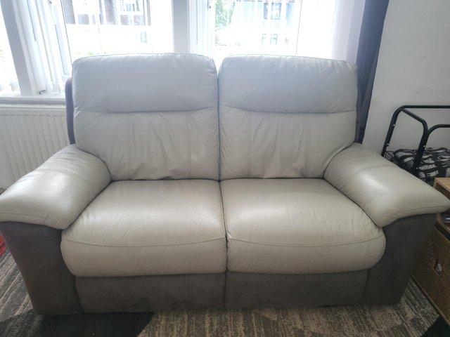 Preview of the first image of 2 two seater leather sofas.