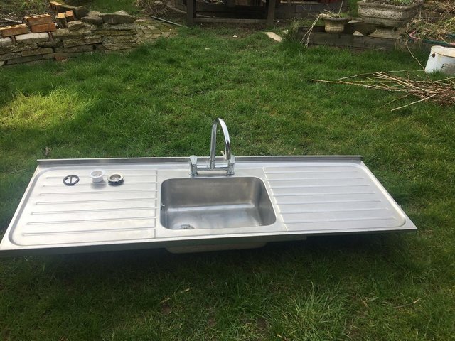 Preview of the first image of Kitchen sink with double drainer and mixer tap.