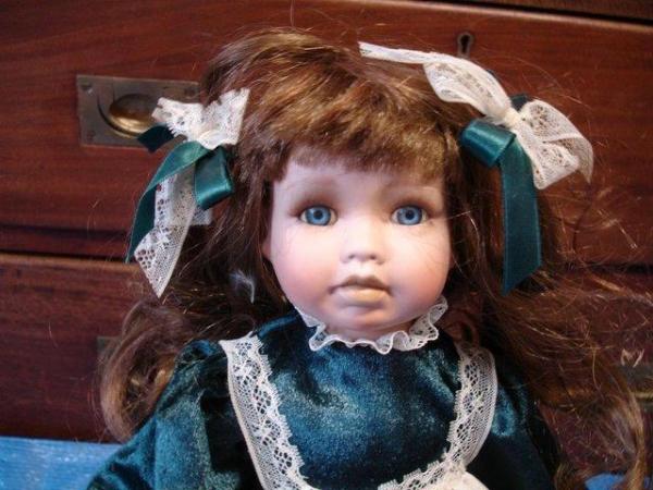 Image 1 of Alberon 43cm porcelain doll in green outfit and doll stand