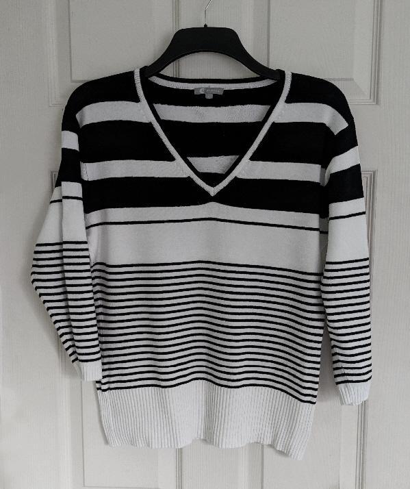 Preview of the first image of Lovely Ladies Black & White Striped Jumper - Size L    B22.