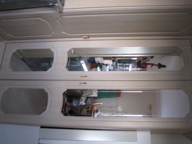 Preview of the first image of L shaped wardrobe with mirrors.