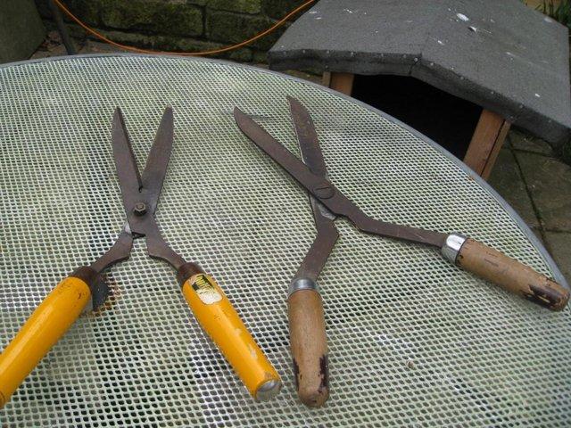 Preview of the first image of Two pairs of good quality gardening hedge sheers..