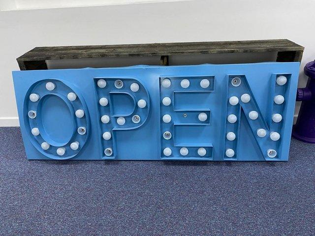 Preview of the first image of Vintage Shop Sign - spells OPEN.
