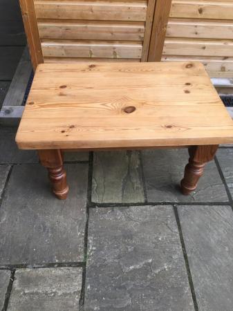 Image 2 of A very sturdy low pine table with turned legs.