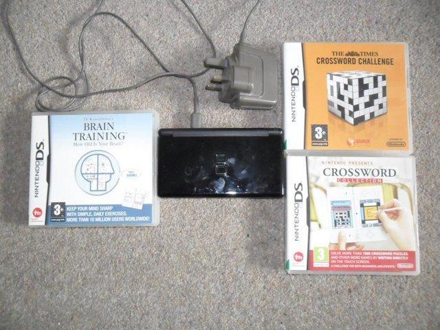 Preview of the first image of Nintendo DS with Brain Training and two  Crossword Colection.