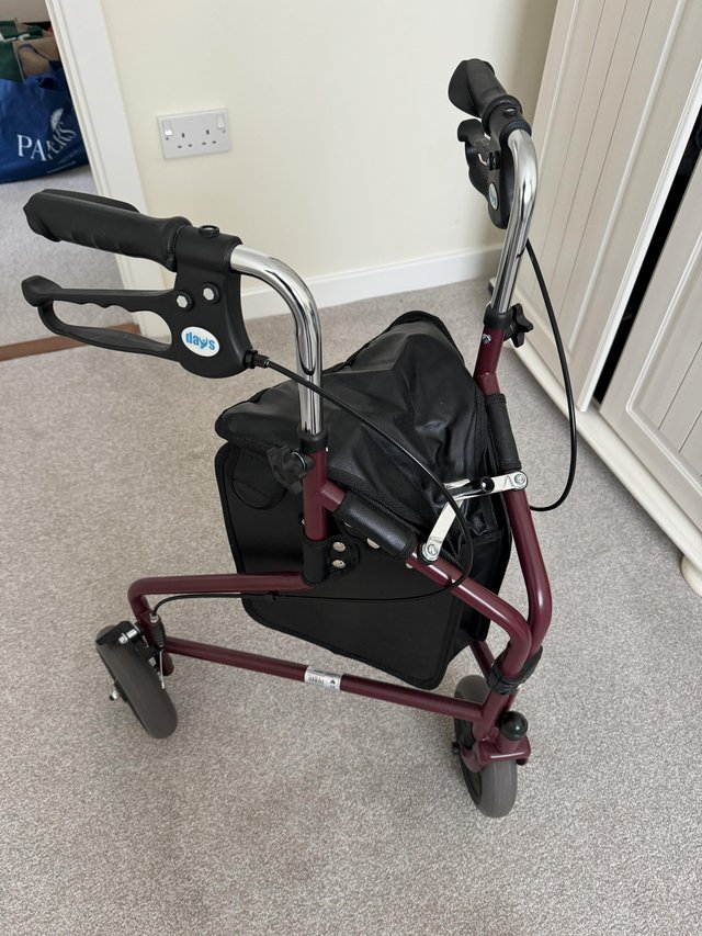 Preview of the first image of Three Wheeled Walker with brakes.