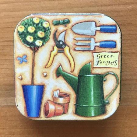 Image 1 of Small square 'green fingers' tin with garden design lid.