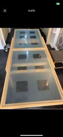 Image 1 of Extending dining table with glass top