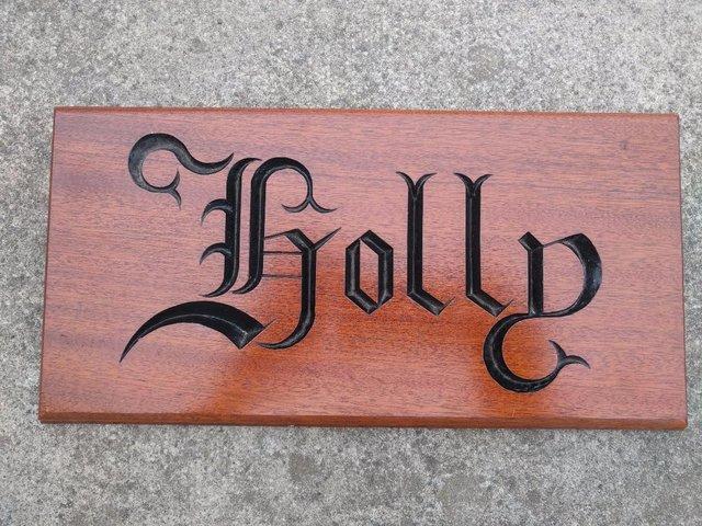 Preview of the first image of WOOD CARVED NAME PLAQUE FOR HORSE HOLLY.