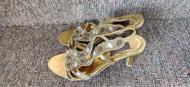 Preview of the first image of High heeled sandals, colour gold, glitter, size 5.