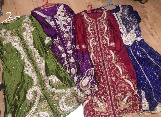 Preview of the first image of 4 Embroidered silk heavy Indian suits -Panjabi salwar/kameez.