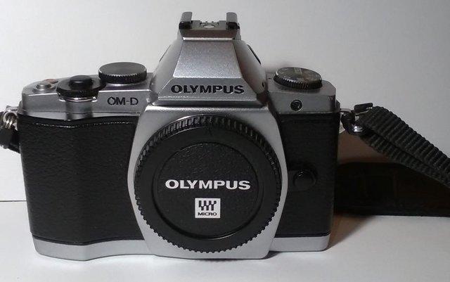 Preview of the first image of OLYMPUS M4/3rds CAMERA SYSTEM WITH 4 LENSES & ACCESSORIES.
