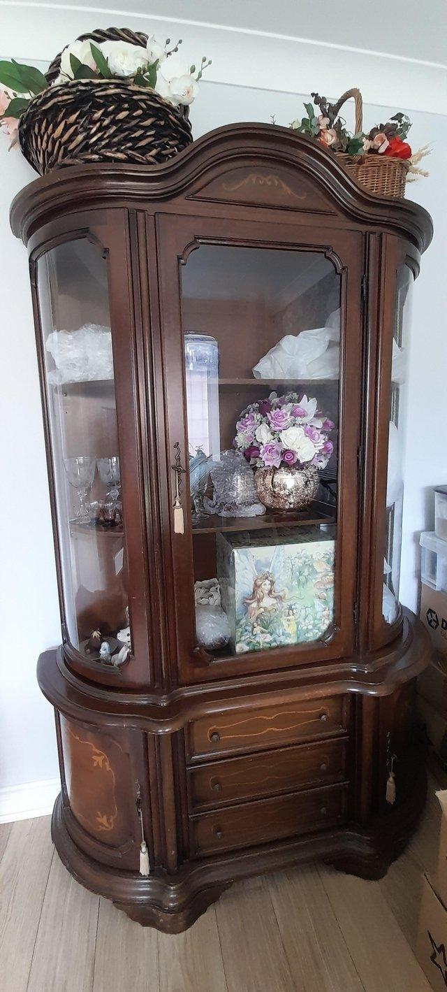 Preview of the first image of Antique display cabinet with bevelled glass..