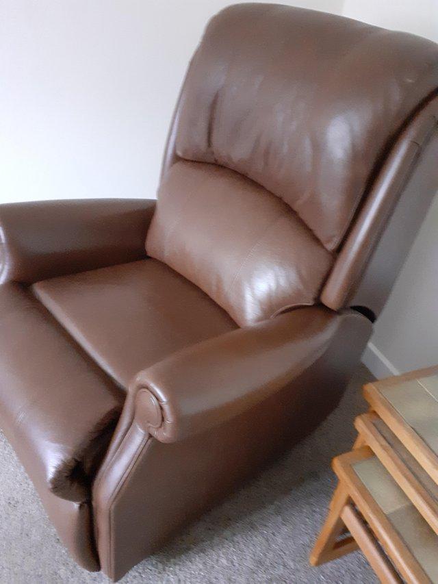 Preview of the first image of HSL rise and recline brown leather chair..