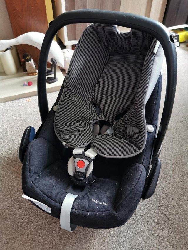 Preview of the first image of Maxi Cosi 2 Way Pebble Plus baby seat.