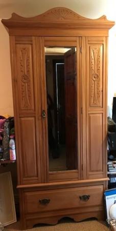 Image 1 of Antique wooden wardrobe; mirror, large, deep drawer and bras