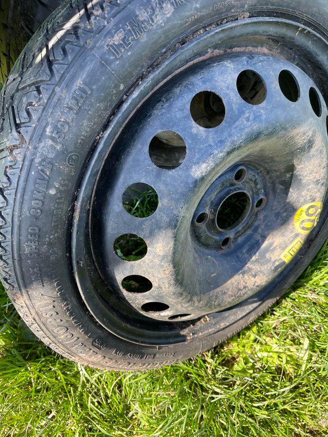 Preview of the first image of Vauxhall Astra space saver spare wheel.