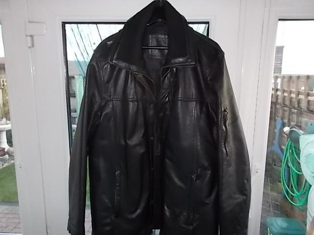 Preview of the first image of Real Black  leather Mens jacket size 42-44 zip up front.