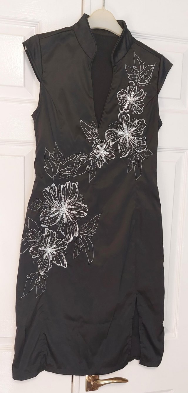 Preview of the first image of Jane Norman black sleeveless dress size 12.