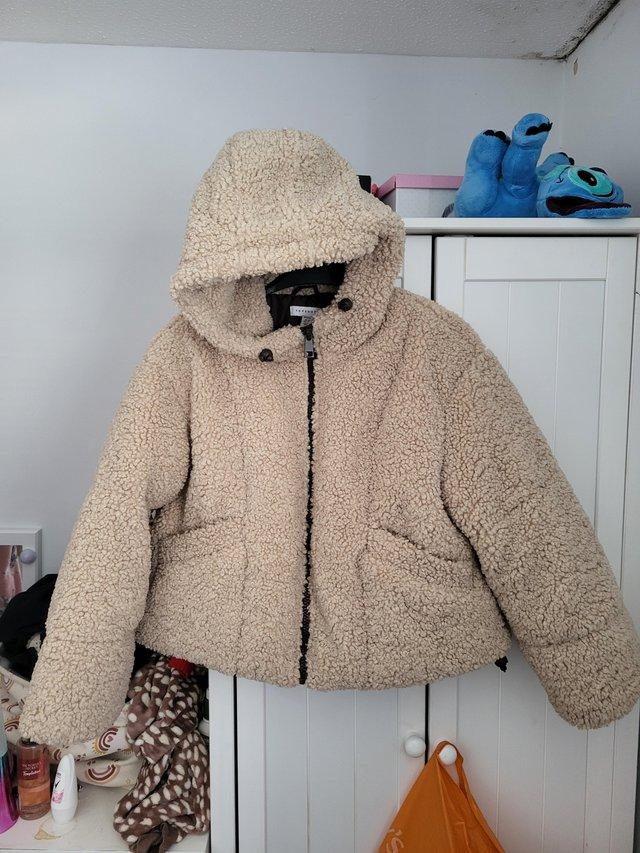 Preview of the first image of Topshop petite teddy coat size 12 brand new.