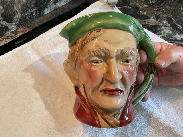 Preview of the first image of Dickens Character Scrooge Ceramic 8” Toby jug.