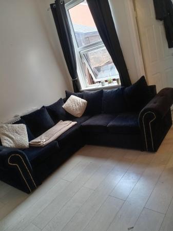 Image 1 of Black velvet Chesterfield style corner sofa