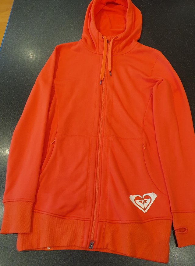 Preview of the first image of Roxy Snow Long Coral Hoodie, size XL.