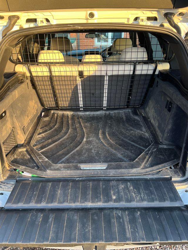 Preview of the first image of BMW X5 Dog guard and boot liner.