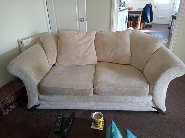 Preview of the first image of 2 large 2 seater matching sofas 1 of which is a sofabed.