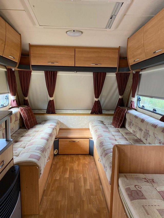 Preview of the first image of 2006 Swift Globetrotter. Four berth.