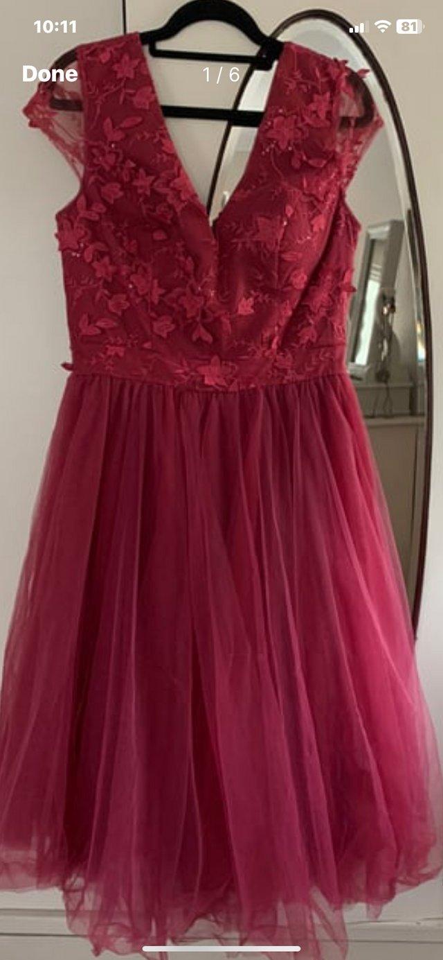 Preview of the first image of Magenta ladies prom/guest wedding dress.