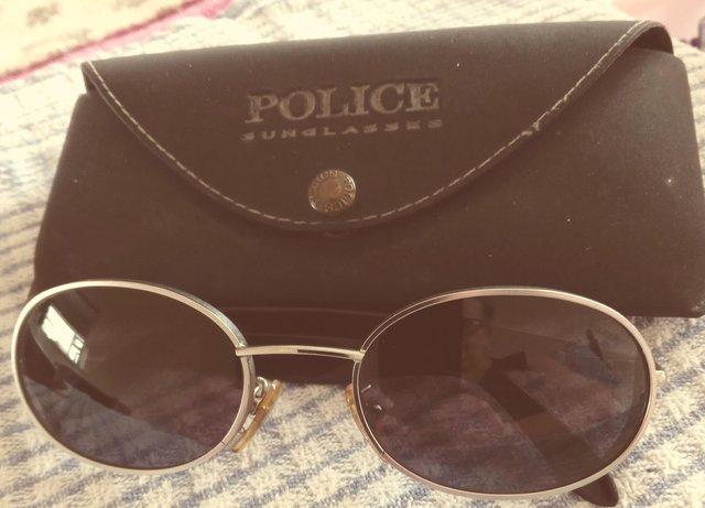 Preview of the first image of Original Police Sunglasses and case..