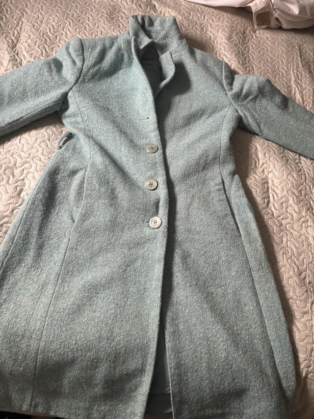Preview of the first image of Women coat medium size long coat.