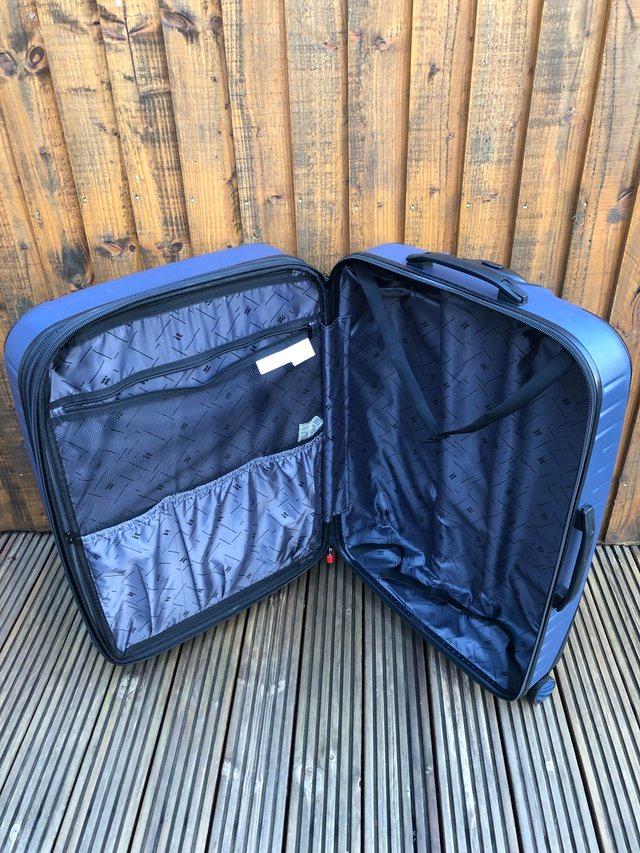 Preview of the first image of Pair of Large IT Airforce Blue Hardshell Suitcases.