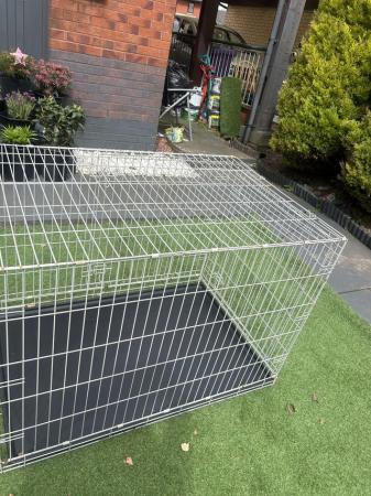 Image 1 of massive dog cage for a bigger dog
