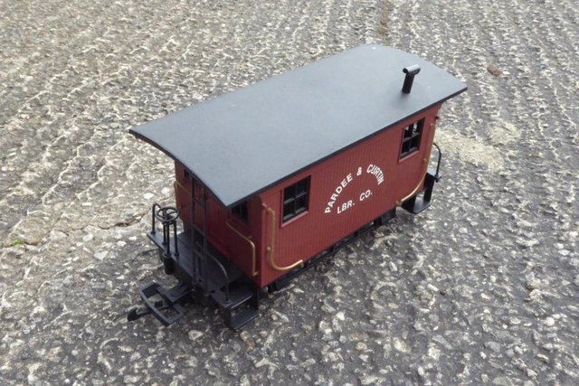 Preview of the first image of Bachmann single axel caboose.