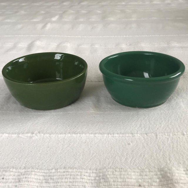 Preview of the first image of 2 dark green ceramic dishes. £1.50 ea/£2.50 both. Can post..