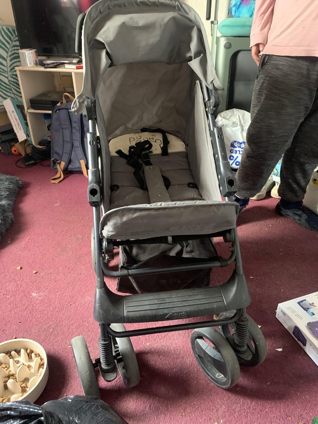 Preview of the first image of Bouncer and Winnie the Pooh pushchair.