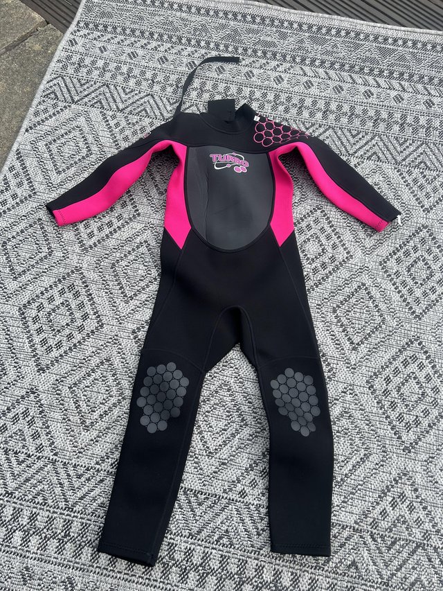 Preview of the first image of Girls the wetsuit factory full length wetsuit 7-8.