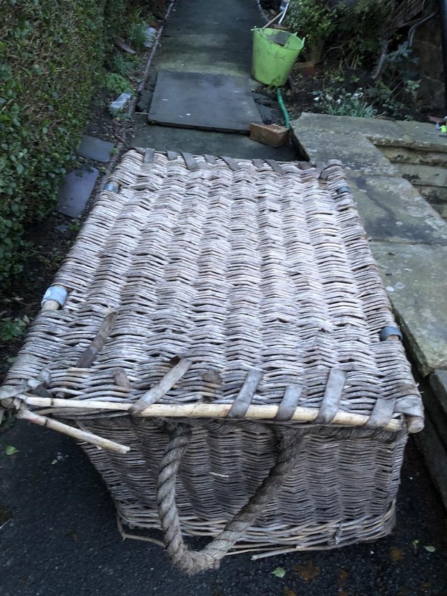 Preview of the first image of Large vintage wicker laundry hamper firewood.