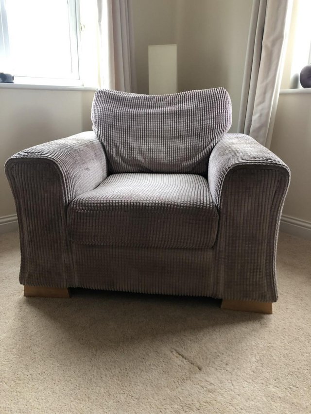 Preview of the first image of DFS comfy beige armchair.
