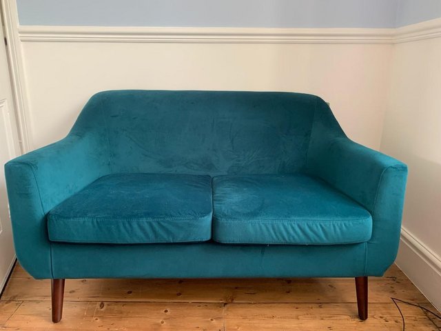 Preview of the first image of Brand new two seater velvet sofa.